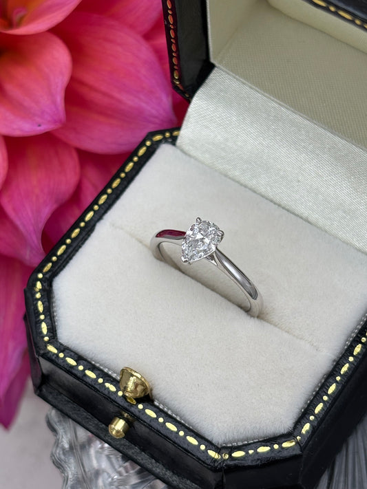 Platinum Pear Cut Diamond Solitaire Ring.
