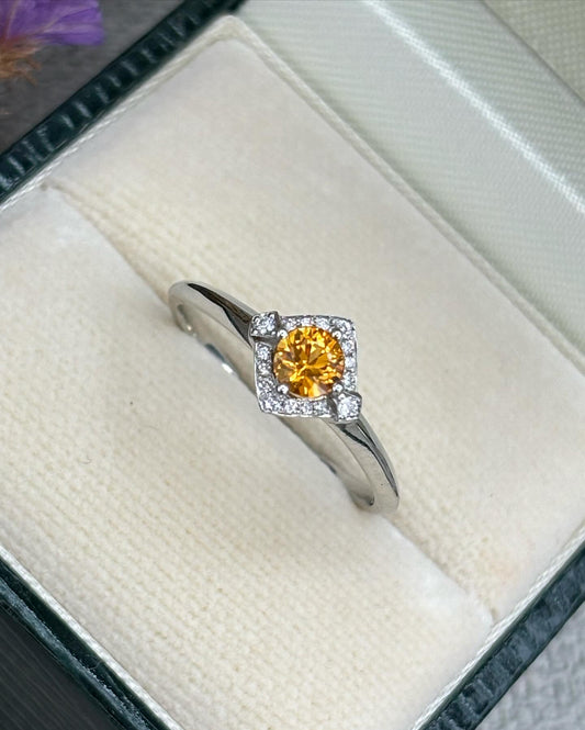 Platinum Orange Sapphire and Diamond Ring
