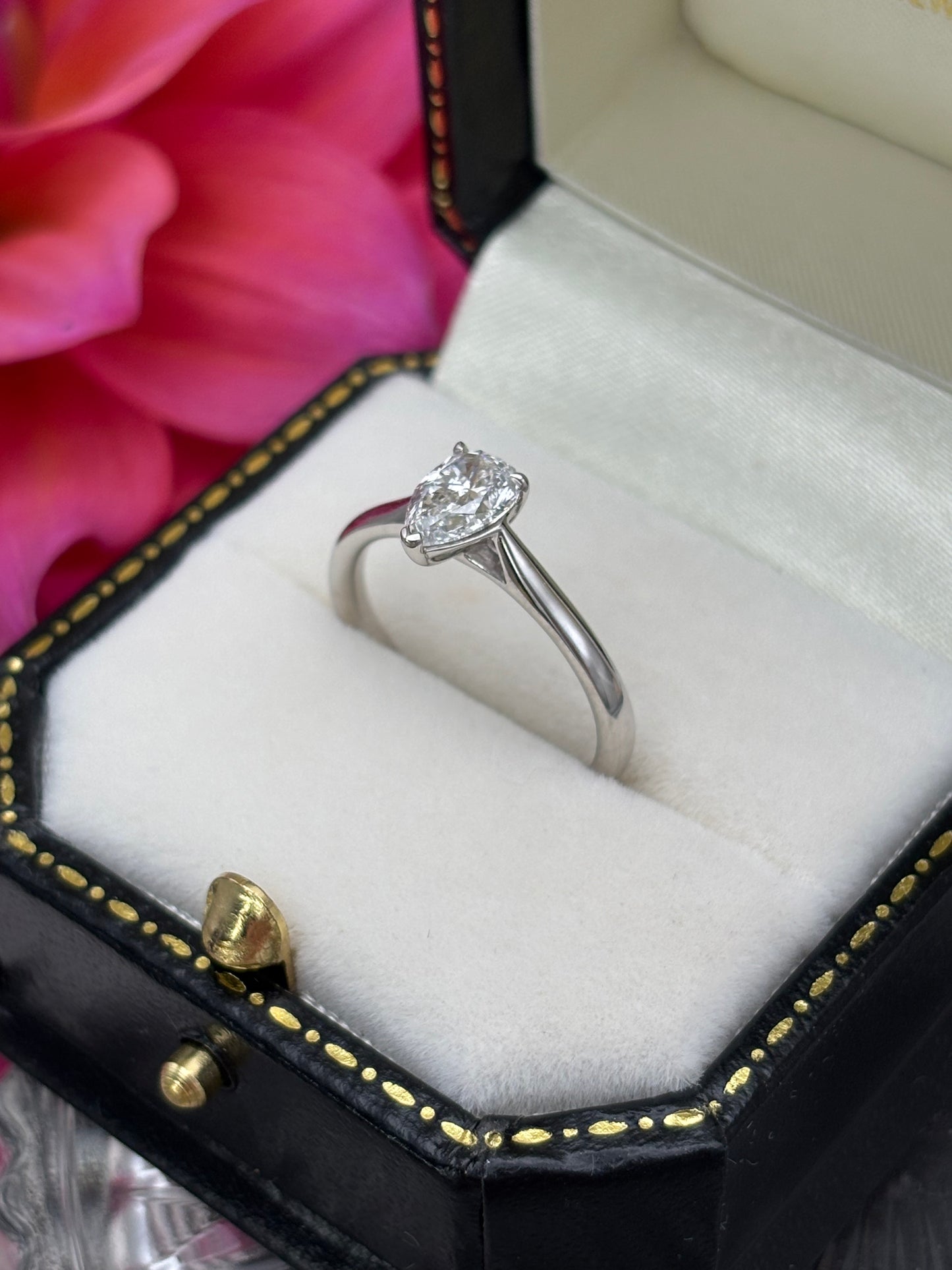 Platinum Pear Cut Diamond Solitaire Ring.