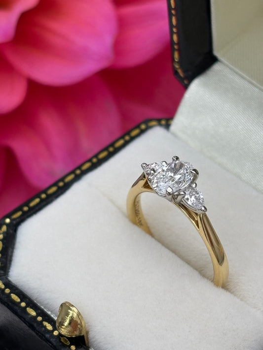 18ct Yellow Gold and Platinum Oval and Pear Cut Diamond Engagement Ring.