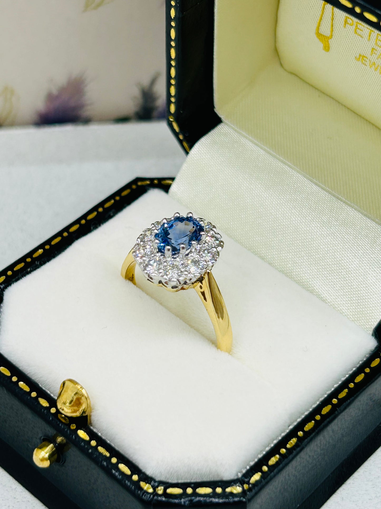 18ct Gold Sapphire and Diamond Cluster Ring.