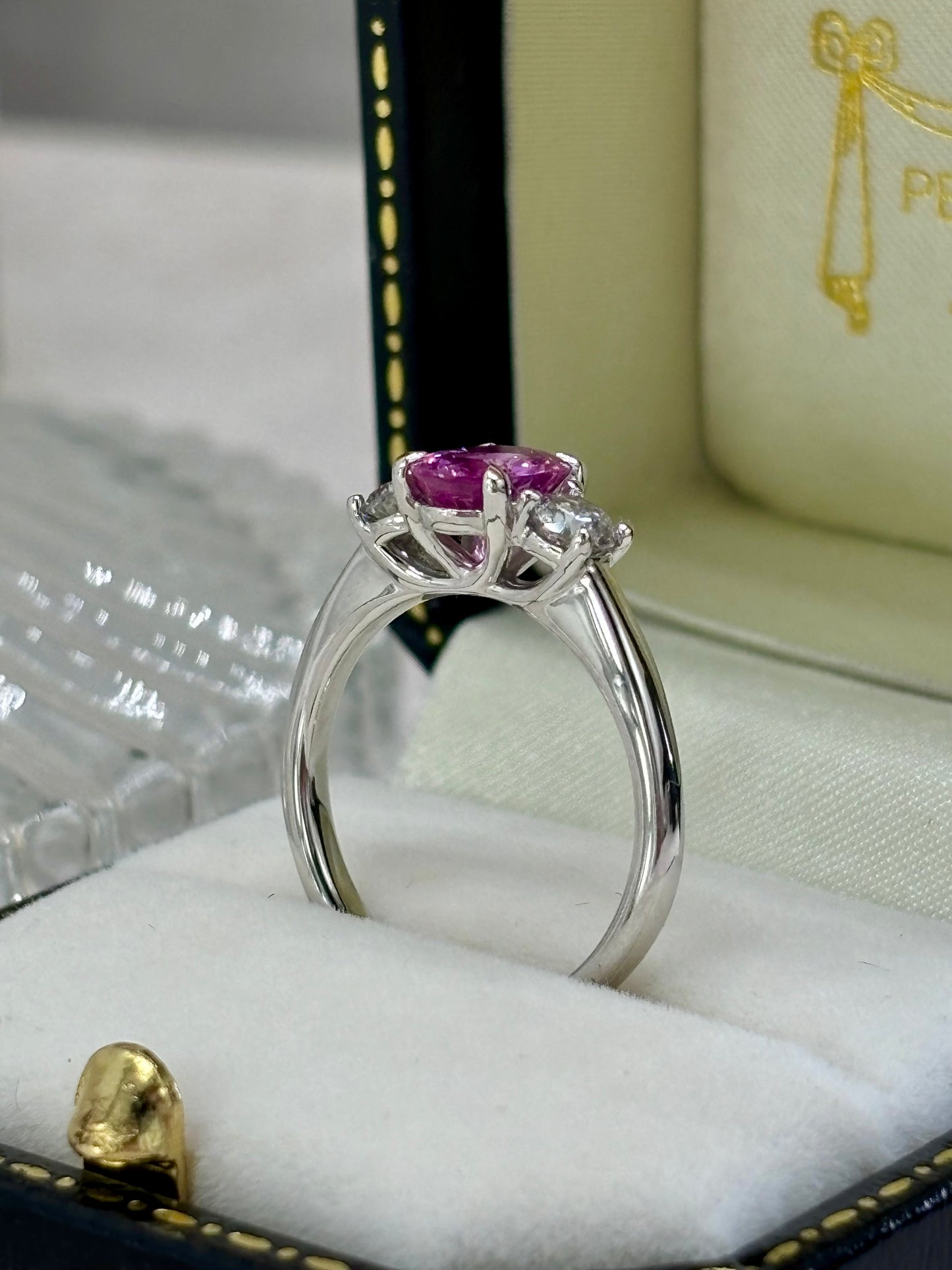 Platinum Pink Sapphire and Diamond Three Stone Ring.