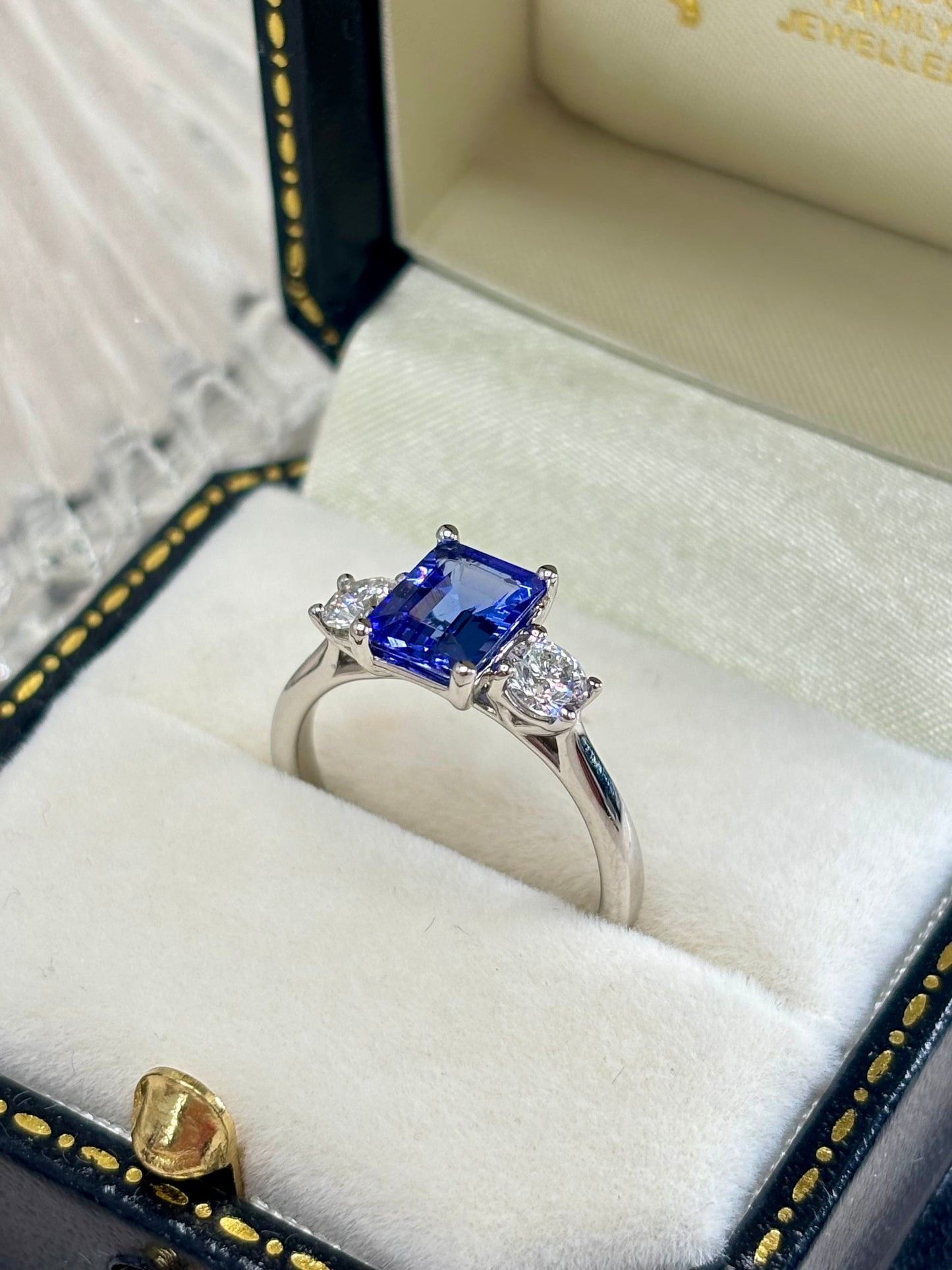 Platinum Tanzanite and Diamond Three Stone Ring.