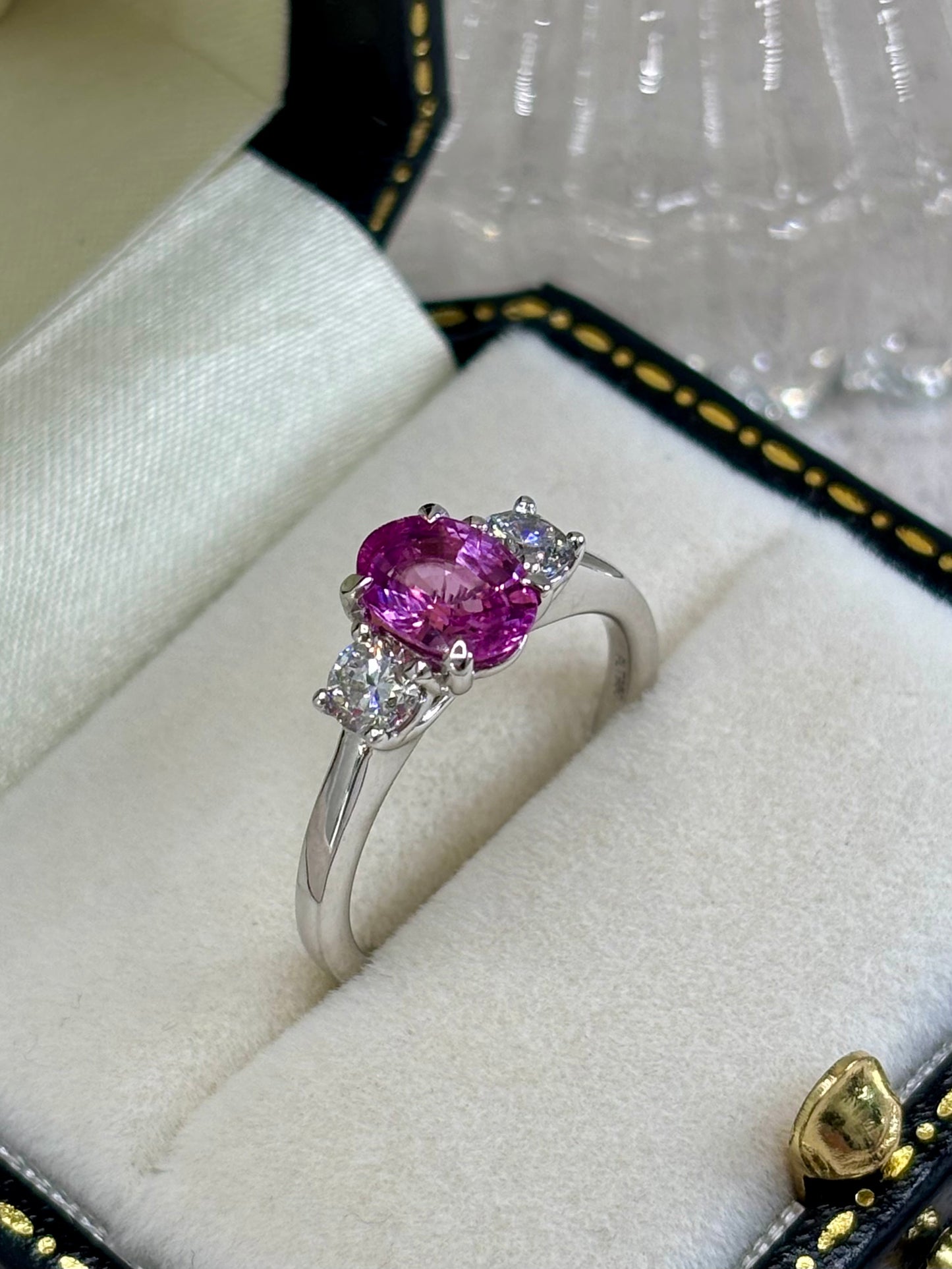 Platinum Pink Sapphire and Diamond Three Stone Ring.