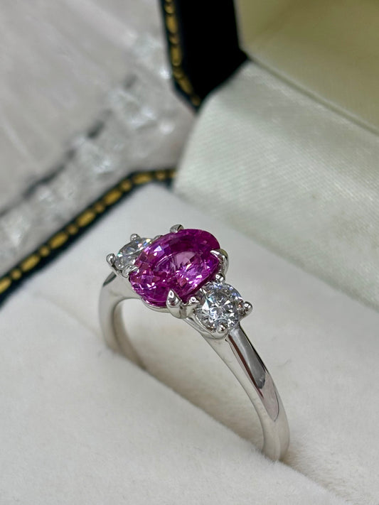 Platinum Pink Sapphire and Diamond Three Stone Ring.