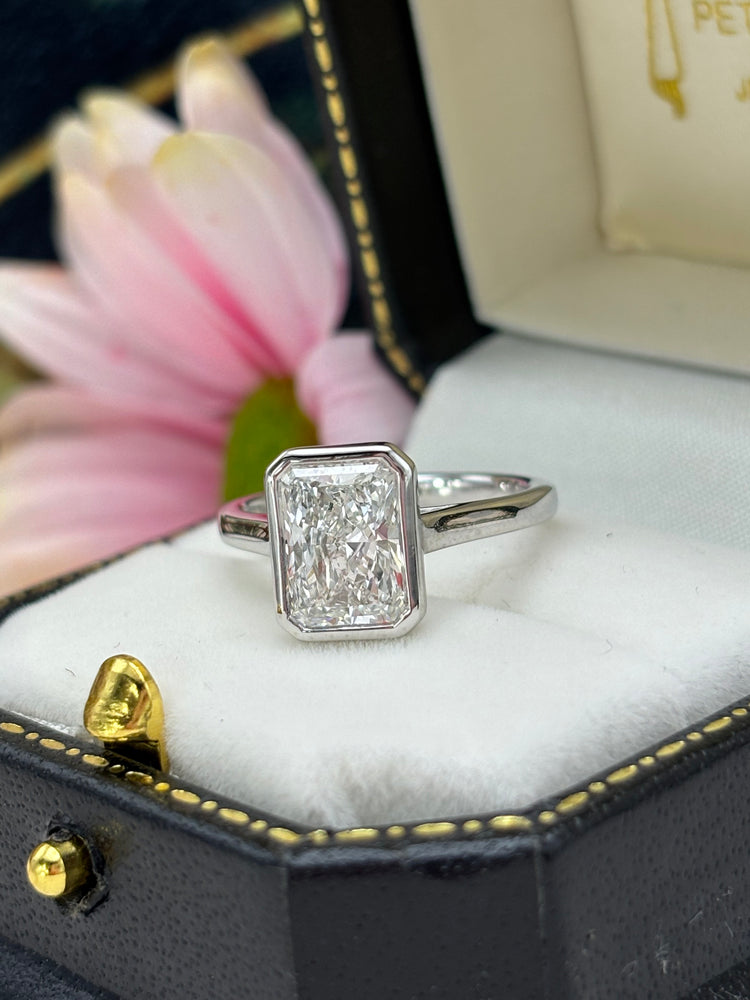 Radiant cut lab-grown diamond solitaire in platinum in a Petersons box