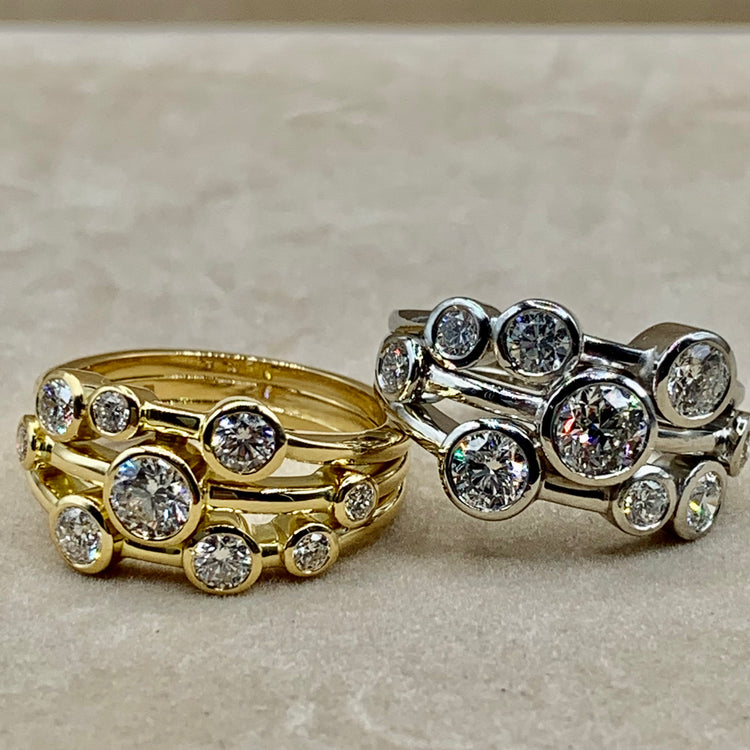 Yellow gold and white gold diamond bubble rings