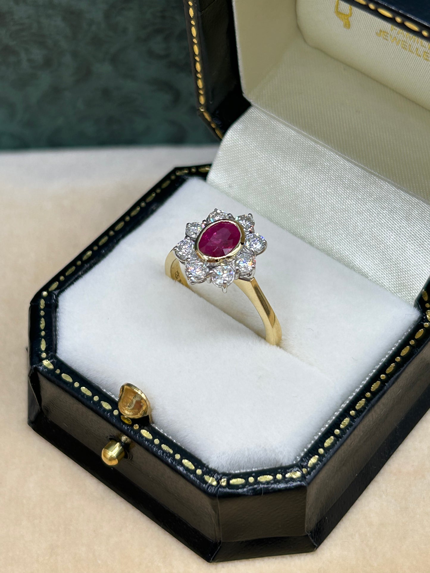 18ct Gold Ruby and Diamond Cluster Ring.