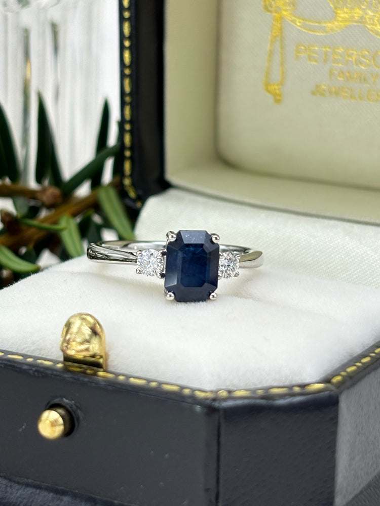 Platinum Blue Sapphire and Diamond Three Stone Ring.