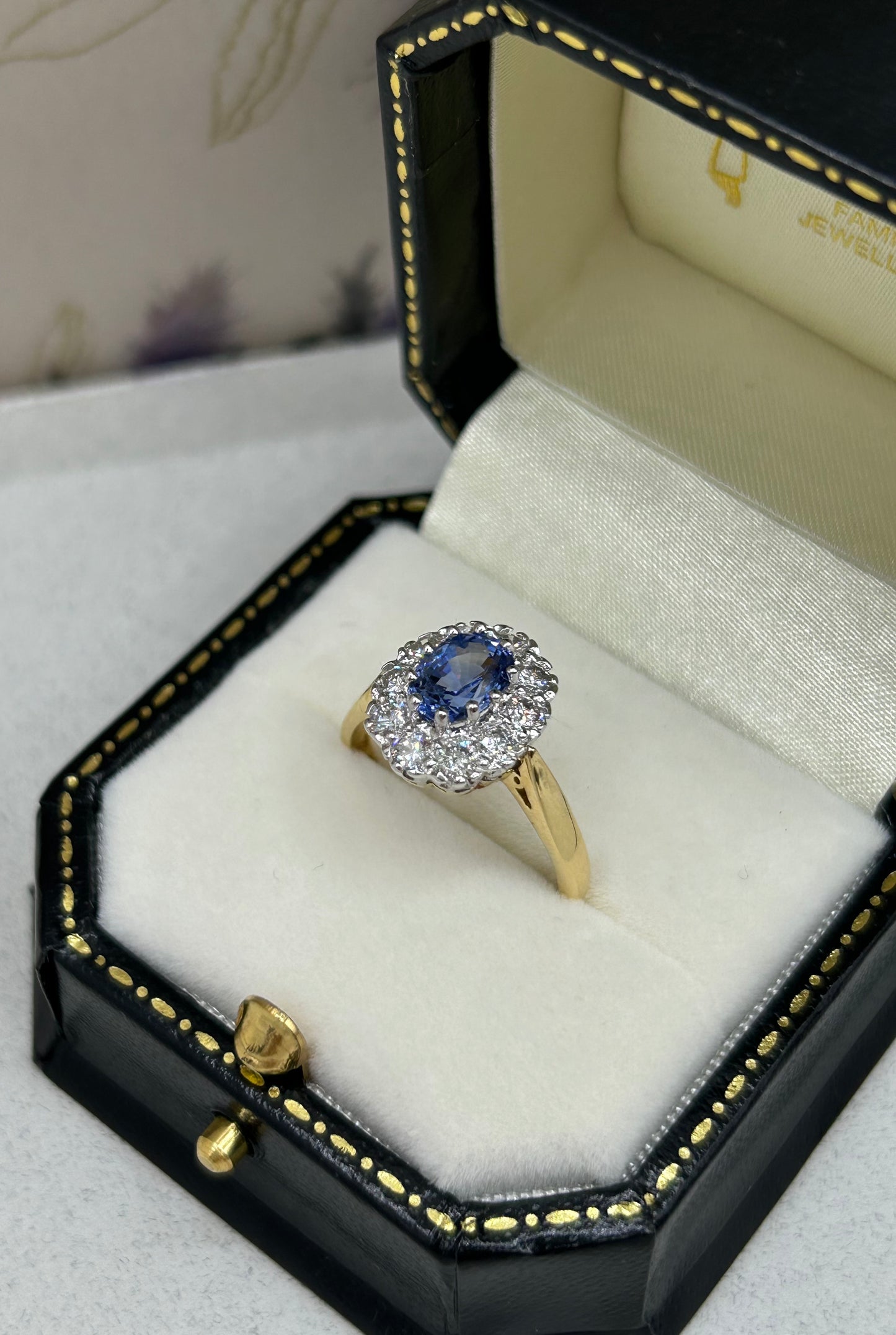 18ct Gold Sapphire and Diamond Cluster Ring.