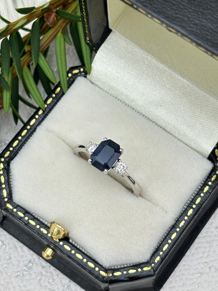 Platinum Blue Sapphire and Diamond Three Stone Ring.