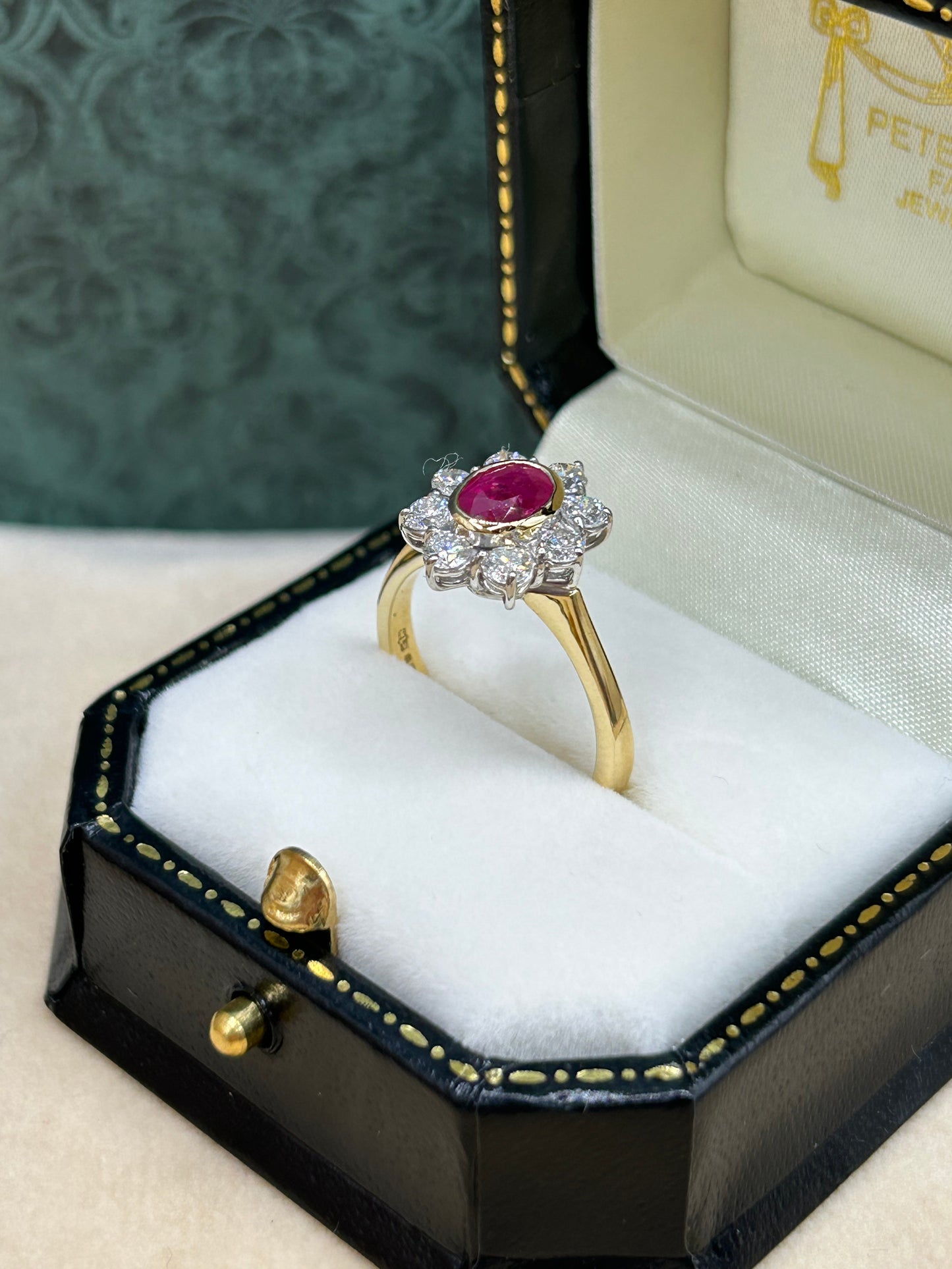18ct Gold Ruby and Diamond Cluster Ring.