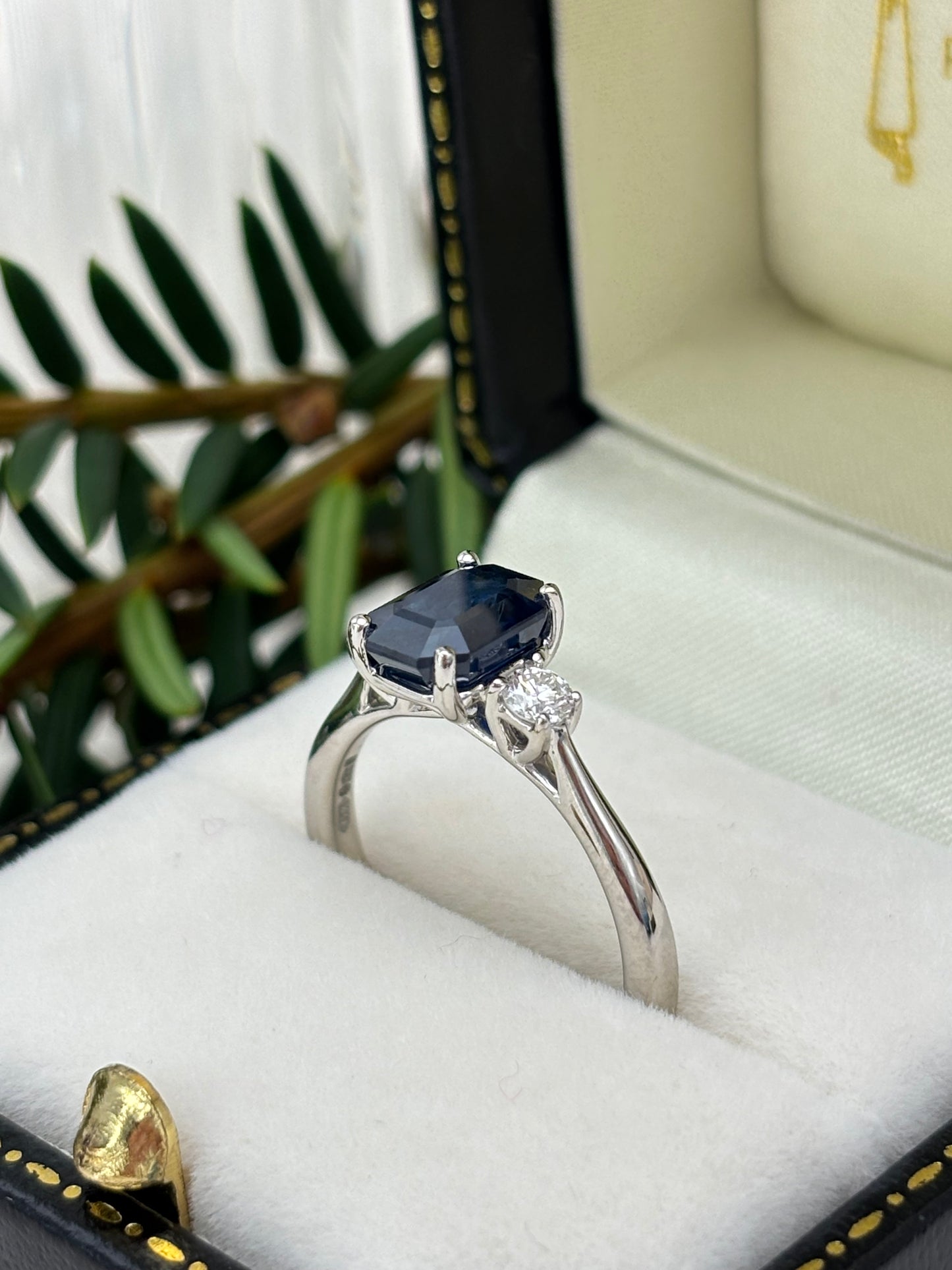 Platinum Blue Sapphire and Diamond Three Stone Ring.
