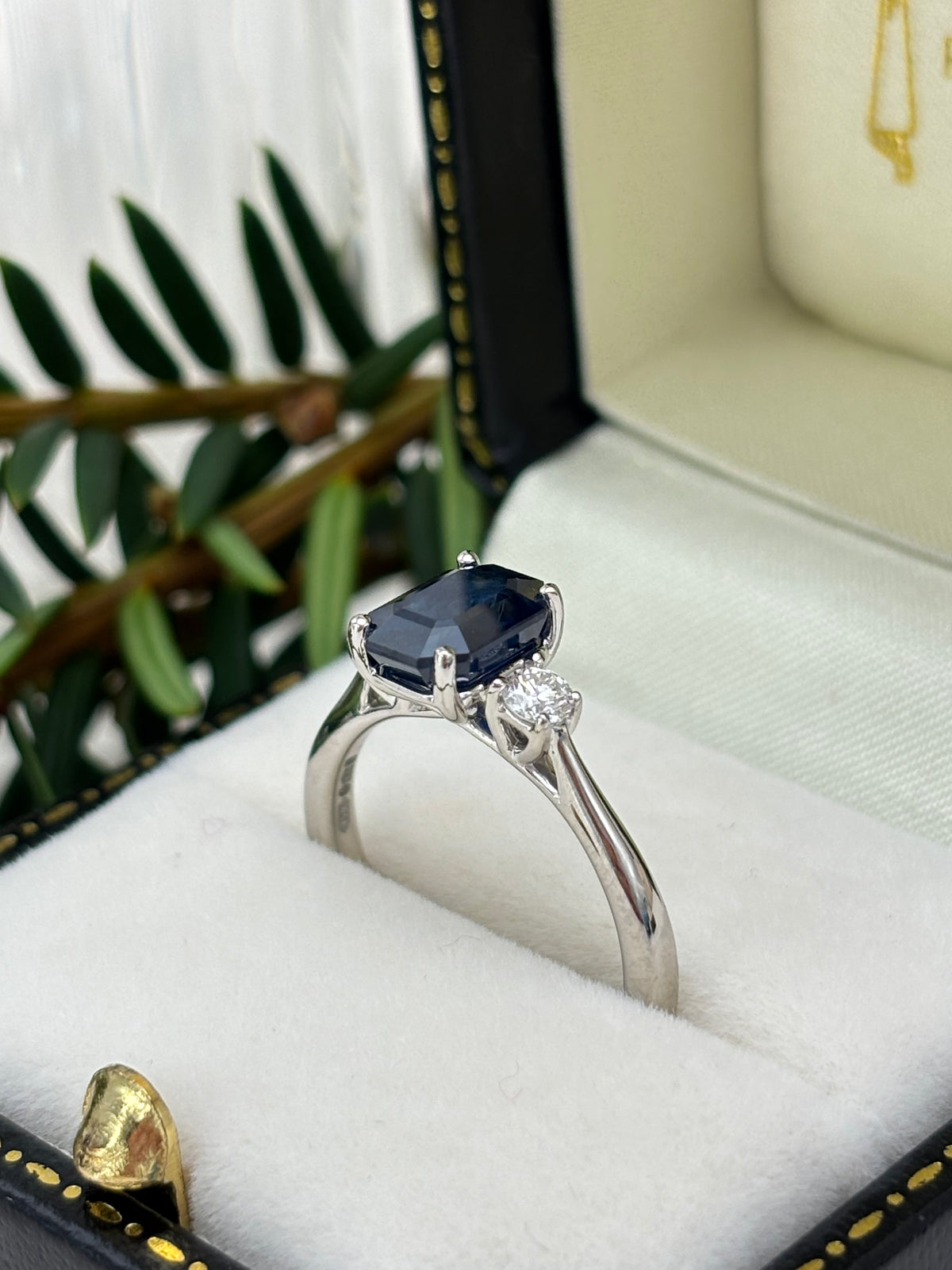 Platinum Blue Sapphire and Diamond Three Stone Ring.