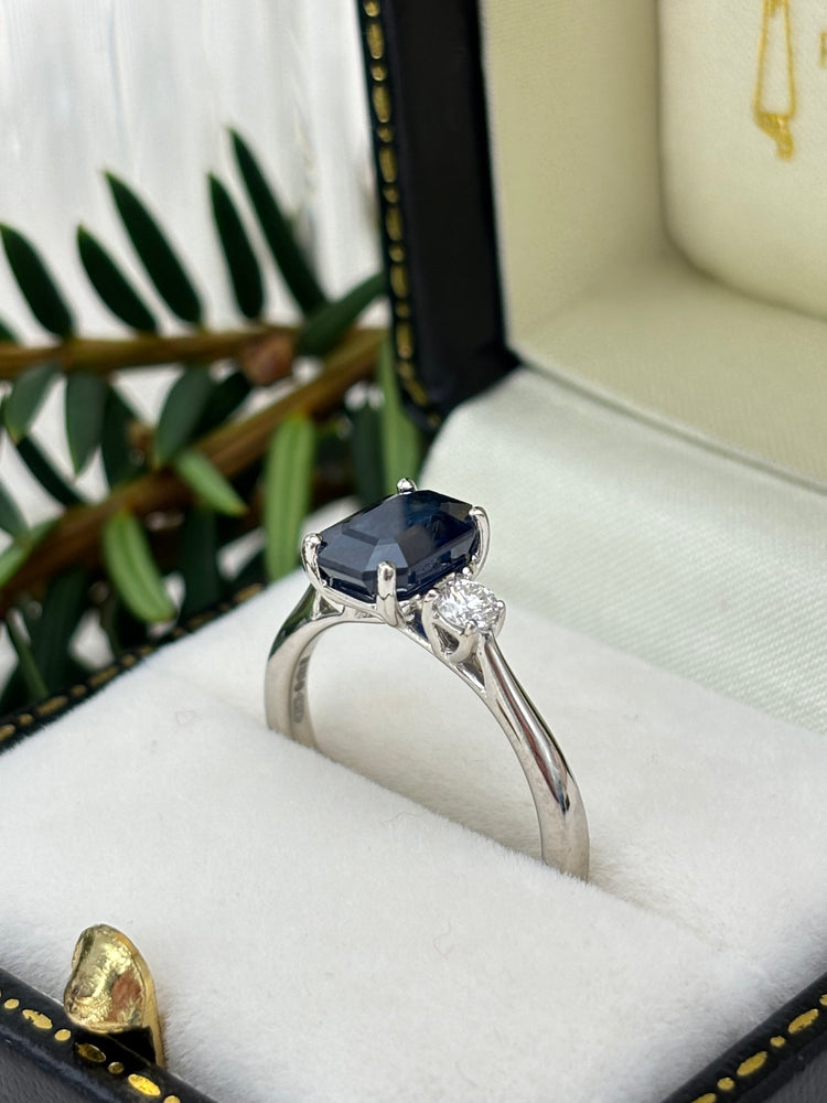 Platinum Blue Sapphire and Diamond Three Stone Ring.