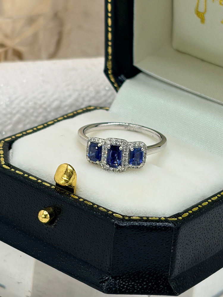 Platinum, Blue Sapphire and Diamond Ring.