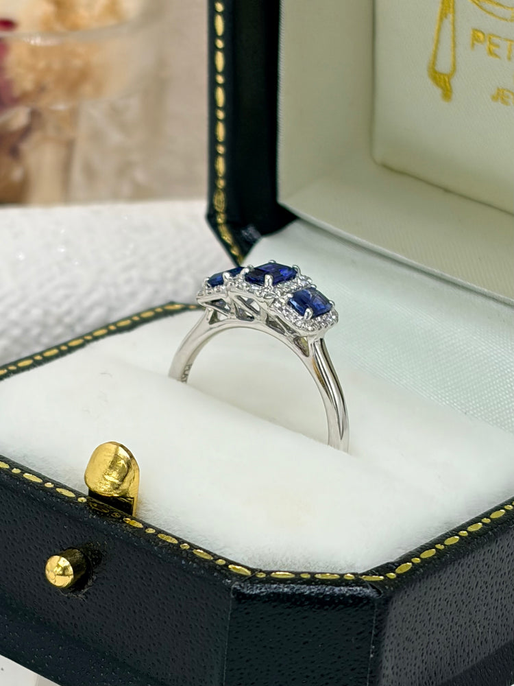 Platinum, Blue Sapphire and Diamond Ring.