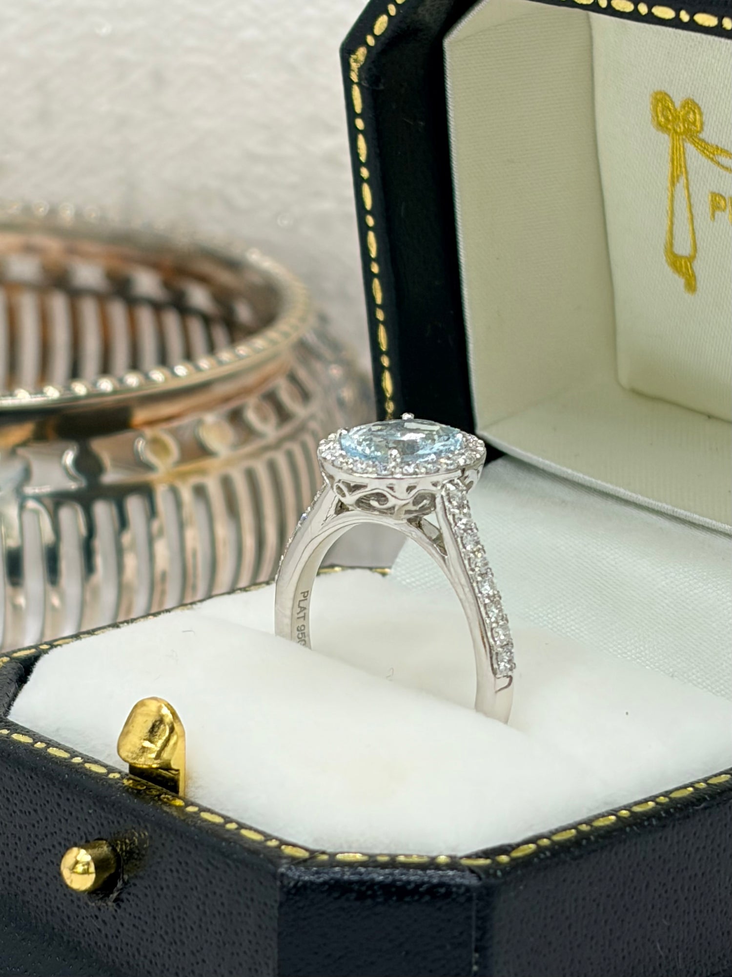 Platinum Aquamarine and Diamond Cluster Ring.
