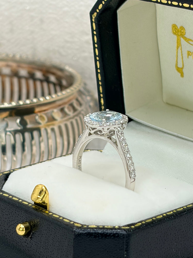 Platinum Aquamarine and Diamond Cluster Ring.