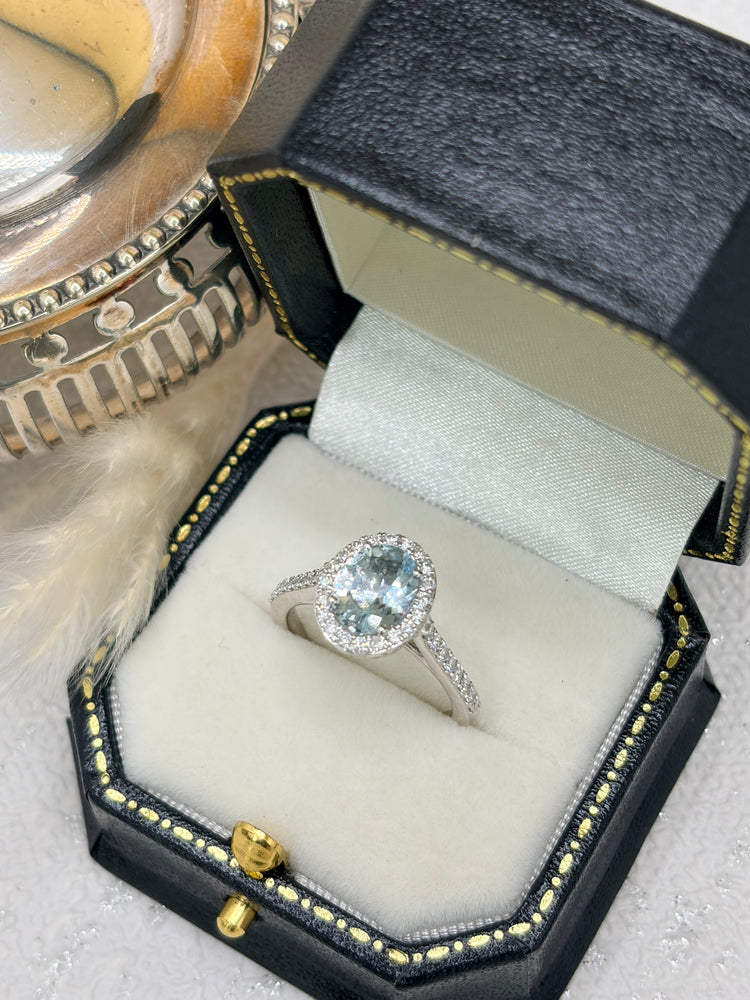 Platinum Aquamarine and Diamond Cluster Ring.